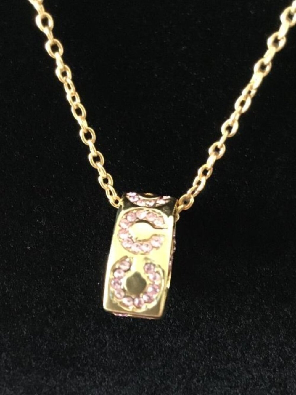 Coach Gold-tone Heart Pendant Necklace with Pink Crystal Accents - Picture 3 of 5